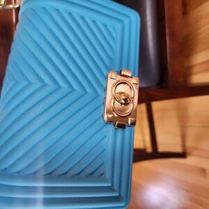 Blue Quilted Crossbody Bag with Gold Clasp